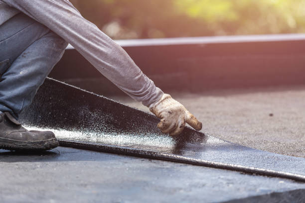 Professional Exterior Waterproofing technician working in Elwood, NY